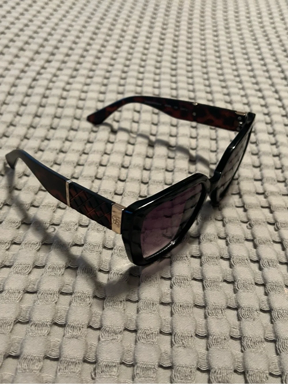 Jessica Simpson Black Cat-Eye Women's Sunglasses with Purple Lenses